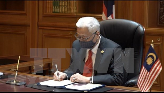 Políticos malasios se unen en lucha pandémica ảnh 1