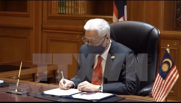 Políticos malasios se unen en lucha pandémica ảnh 1
