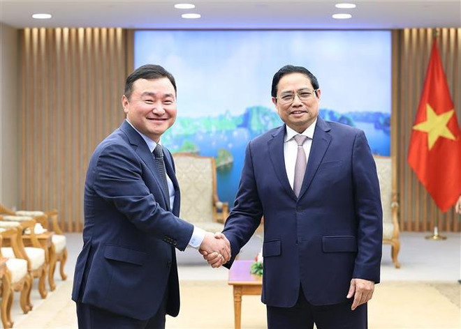 Premier vietnamita recibe al director general de Samsung ảnh 1