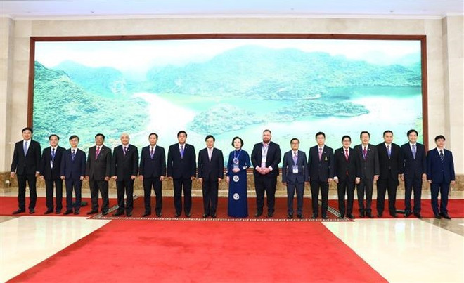 Vicepremier recibe a jefes de delegaciones participantes en ACCSM 21 ảnh 1