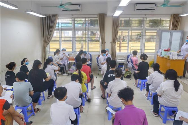 Hanoi agiliza programa de vacunación contra COVID-19 ảnh 2 Hanoi agiliza programa de vacunación contra COVID-19 ảnh 2