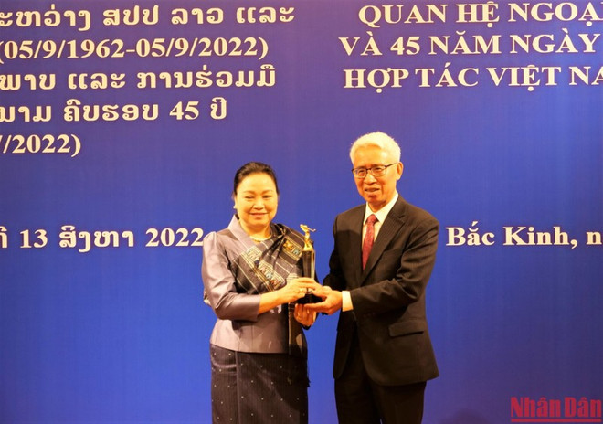 Conmemoran aniversario de relaciones Vietnam-Laos en China ảnh 1 Conmemoran aniversario de relaciones Vietnam-Laos en China ảnh 1