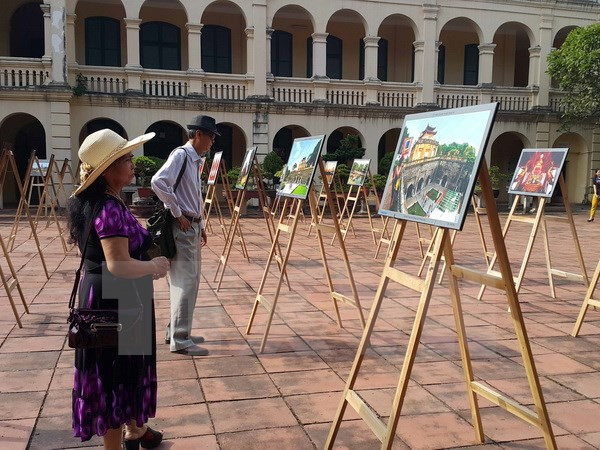 Exhiben impresionantes fotos sobre las fuerzas armadas de Hanoi ảnh 1 Exhiben impresionantes fotos sobre las fuerzas armadas de Hanoi ảnh 1