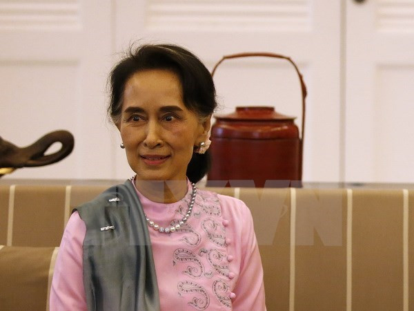 Asesora de Estado de Myanmar visita China ảnh 1
