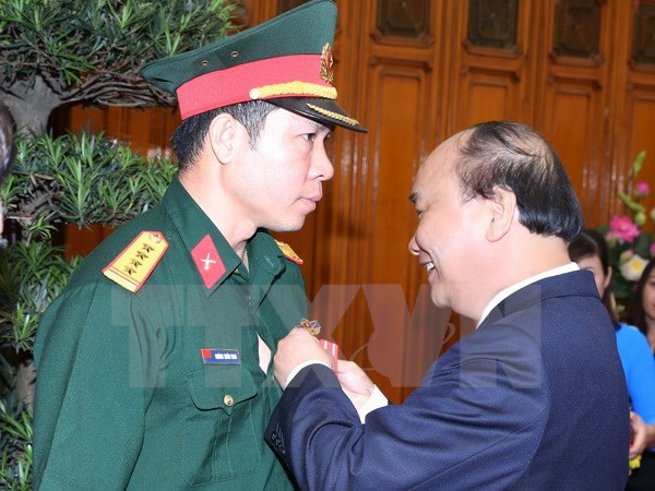 Premier felicita a delegación deportiva vietnamita ảnh 1 Premier felicita a delegación deportiva vietnamita ảnh 1