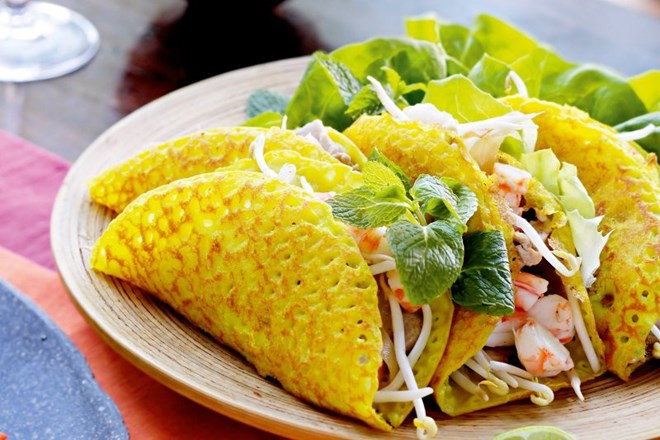 ‘Banh xeo’, una sencilla delicia de las tres regiones de Vietnam ảnh 1 ‘Banh xeo’, una sencilla delicia de las tres regiones de Vietnam ảnh 1