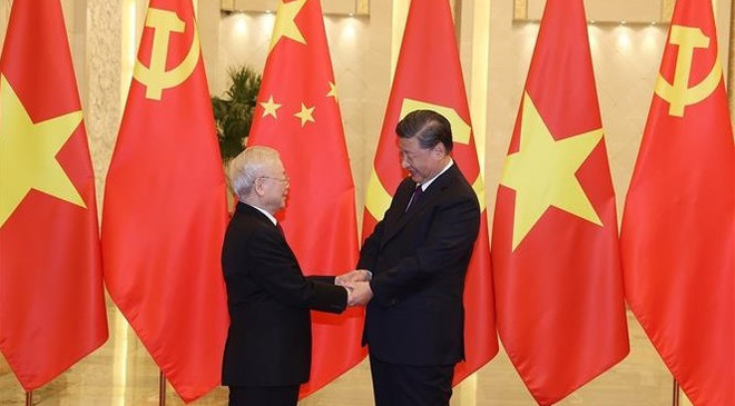 Efectúan en China acto de recibimiento al secretario general de PCV ảnh 1 Efectúan en China acto de recibimiento al secretario general de PCV ảnh 1
