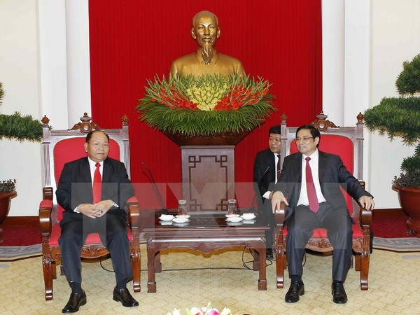 Alto funcionario del PCV recibe a ministro del Interior de Laos ảnh 1