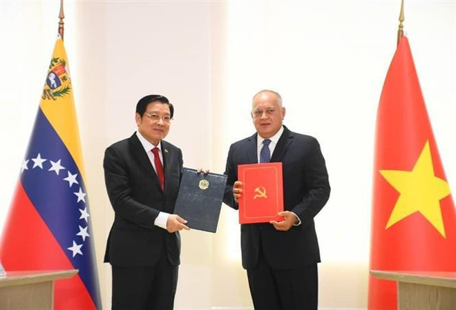 Delegación partidista de Vietnam realiza visita de trabajo en Venezuela ảnh 2
