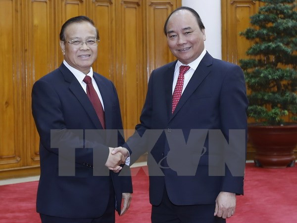 Premier de Vietnam exhorta a impulsar proyectos en Laos ảnh 1 Premier de Vietnam exhorta a impulsar proyectos en Laos ảnh 1