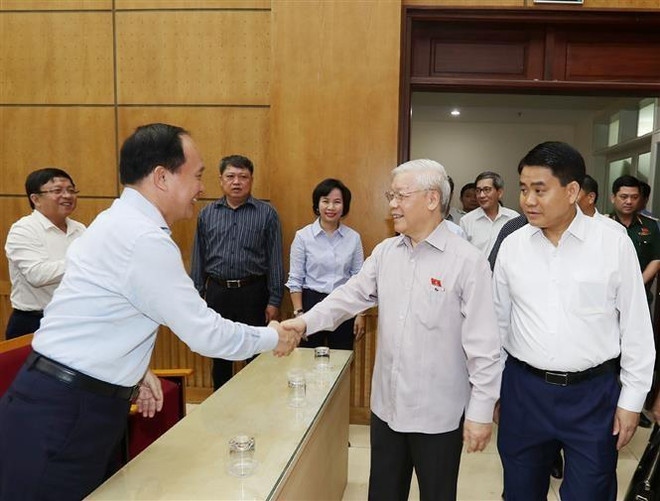 [Foto] Secretario general del Partido Comunista y presidente de Vietnam con votantes de Hanoi ảnh 4