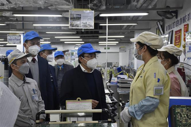 Más del 90 por ciento de trabajadores en metrópolis vietnamitas regresan al trabajo después del Tet ảnh 2 Más del 90 por ciento de trabajadores en metrópolis vietnamitas regresan al trabajo después del Tet ảnh 2