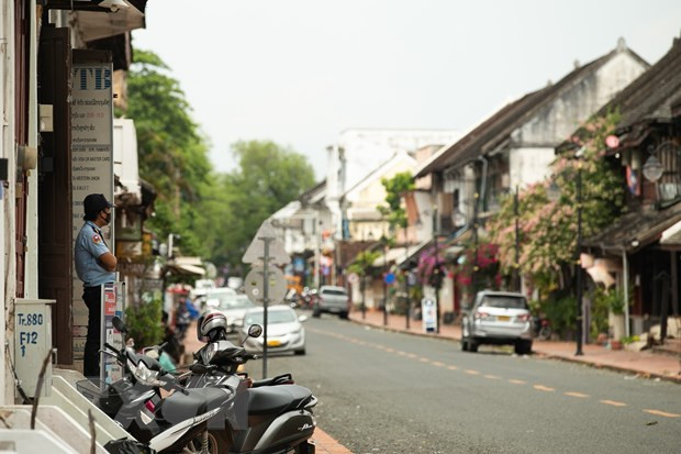 Recomiendan a vietnamitas en Laos fortalecer medidas contra el COVID-19 ảnh 1