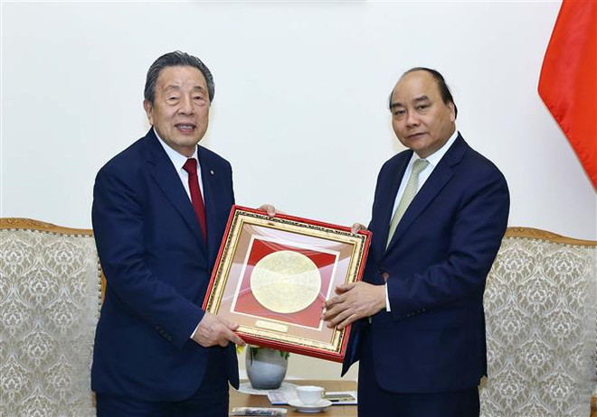 Comprometido premier de Vietnam a crear entorno favorable para inversores extranjeros ảnh 1