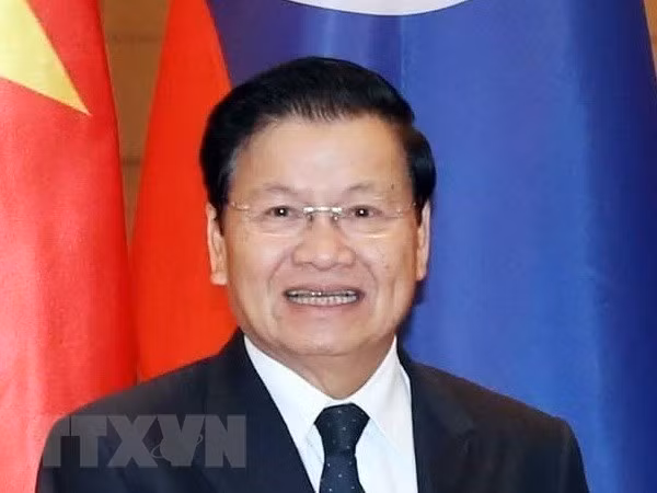 Concluye primer ministro de Laos visita a Vietnam ảnh 1