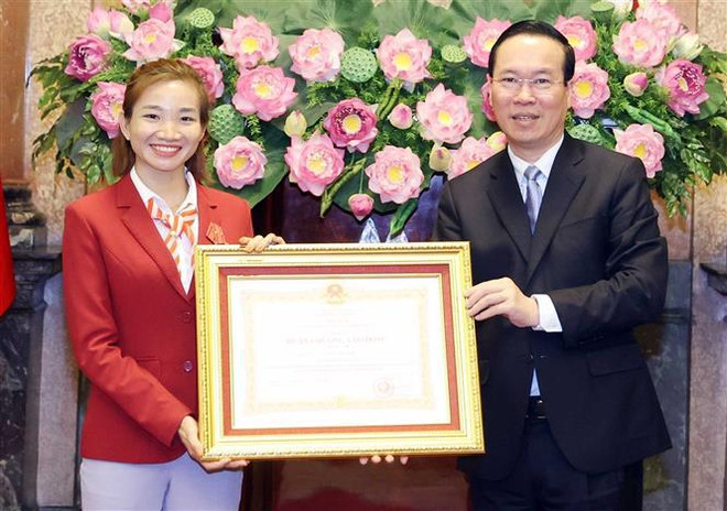 Presidente vietnamita se reúne con atletas destacados en SEA Games 32 ảnh 1 Presidente vietnamita se reúne con atletas destacados en SEA Games 32 ảnh 1
