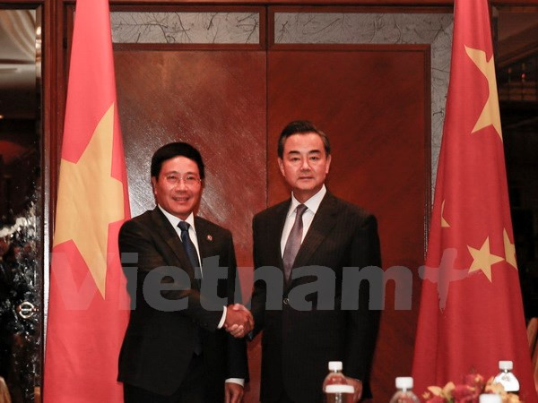 Cancilleres de Vietnam y China intercambian asuntos de interés común ảnh 1 Cancilleres de Vietnam y China intercambian asuntos de interés común ảnh 1