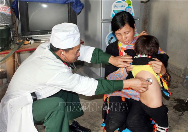 Aprueban programa de médicos militares y civiles para la mejora de sanidad pública en Vietnam ảnh 2