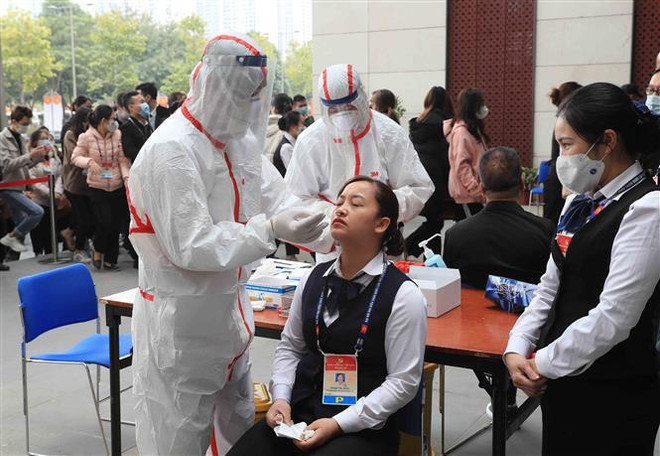 Realizan pruebas del COVID-19 a participantes en XIII Congreso partidista de Vietnam ảnh 1 Realizan pruebas del COVID-19 a participantes en XIII Congreso partidista de Vietnam ảnh 1