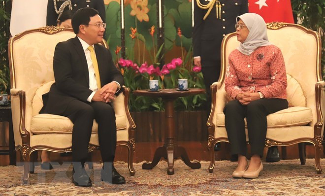 Vicepremier vietnamita se reúne con dirigentes de Singapur ảnh 1 Vicepremier vietnamita se reúne con dirigentes de Singapur ảnh 1