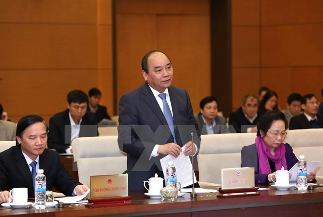 Parlamento vietnamita escruta informe de trabajo de gobierno y premier ảnh 1 Parlamento vietnamita escruta informe de trabajo de gobierno y premier ảnh 1
