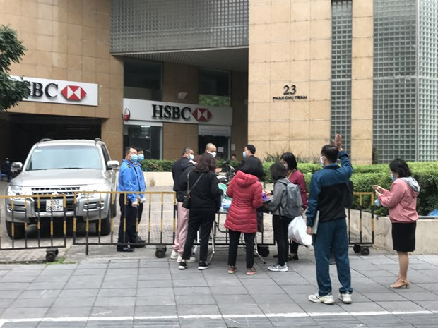 Hanoi libera 14 de 18 áreas bloqueadas y aisladas por el COVID-19 ảnh 1