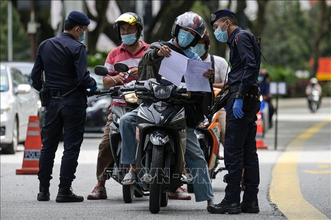 Malasia aumenta multas para personas cometidas de reglas contra COVID-19 ảnh 1 Malasia aumenta multas para personas cometidas de reglas contra COVID-19 ảnh 1