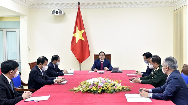 Primer ministro de Vietnam dialoga con su homólogo de China ảnh 1 Primer ministro de Vietnam dialoga con su homólogo de China ảnh 1