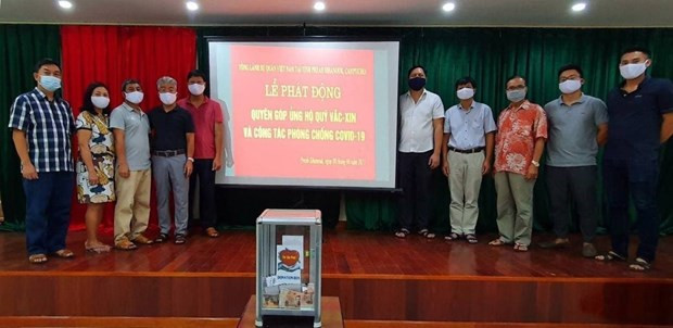 Vietnamitas en Camboya apoyan al Fondo Nacional de Vacunas contra COVID-19 ảnh 1 Vietnamitas en Camboya apoyan al Fondo Nacional de Vacunas contra COVID-19 ảnh 1