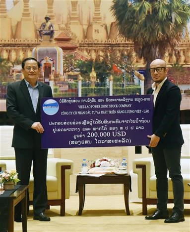 Premier laosiano agradece apoyo de empresa vietnamita ảnh 2 Premier laosiano agradece apoyo de empresa vietnamita ảnh 2