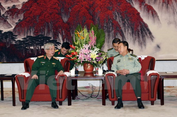 Altos funcionarios militares de Vietnam y China se reúnen en Beijing ảnh 1