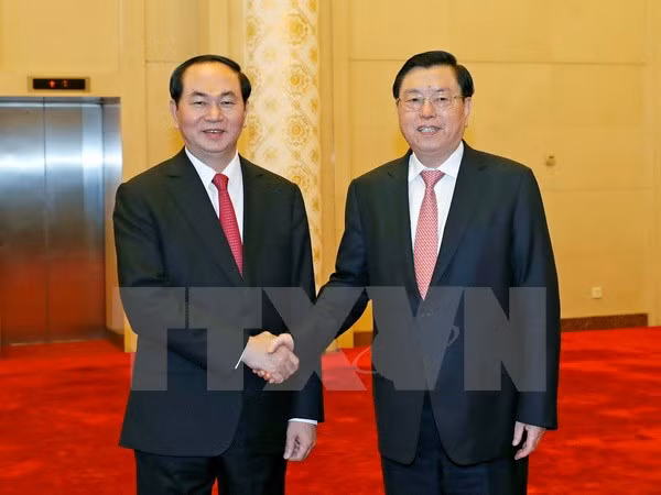 Presidente vietnamita dialoga con líderes chinos ảnh 1 Presidente vietnamita dialoga con líderes chinos ảnh 1