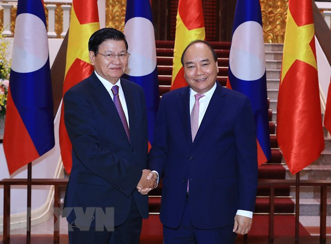 Premier de Laos llega a Vietnam para Reunión 41 del Comité Intergubernamental ảnh 1 Premier de Laos llega a Vietnam para Reunión 41 del Comité Intergubernamental ảnh 1