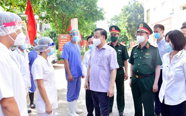 Dirigente de Hanoi insta a mantener sinergia para vencer al COVID-19 ảnh 1 Dirigente de Hanoi insta a mantener sinergia para vencer al COVID-19 ảnh 1