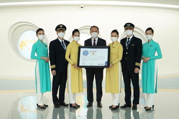 Vietnam Airlines recibe certificado de cinco estrellas en seguridad y prevención contra el COVID-19 ảnh 2 Vietnam Airlines recibe certificado de cinco estrellas en seguridad y prevención contra el COVID-19 ảnh 2
