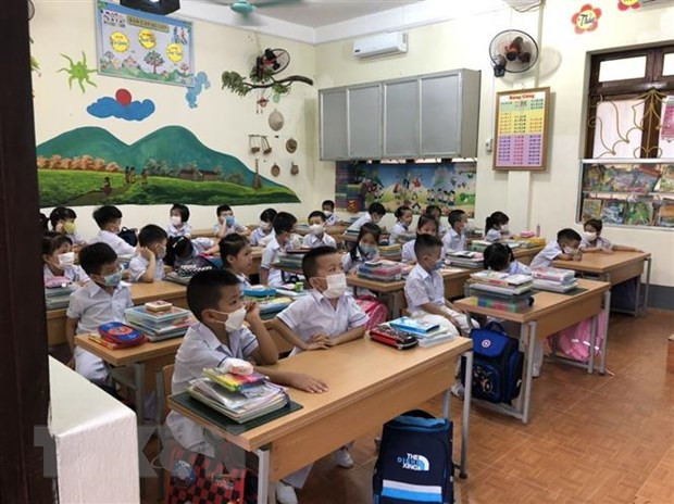 Localidad vietnamita libera matrícula para niños en edad preescolar y alumnos de secundaria ảnh 1