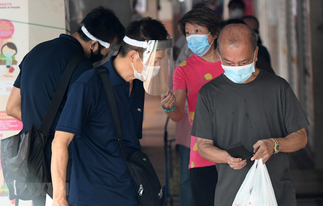 Singapur aliviará restricciones tras registrar descenso de casos de coronavirus ảnh 1 Singapur aliviará restricciones tras registrar descenso de casos de coronavirus ảnh 1