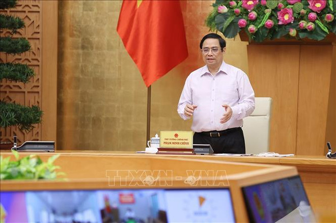 Primer Ministro vietnamita insta a reforzar el control epidémico en Kien Giang y Tien Giang ảnh 1