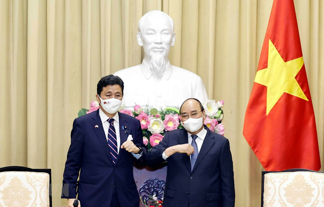 Vietnam exhorta al apoyo de Japón en acceso a vacunas contra COVID-19 ảnh 1 Vietnam exhorta al apoyo de Japón en acceso a vacunas contra COVID-19 ảnh 1