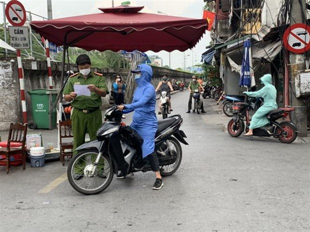 Levantan bloqueo aplicado en diferentes lugares afectados por COVID-19 en Hanoi ảnh 1