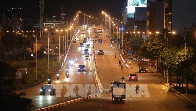 Hanoi suaviza el bloqueo contra el COVID-19 para recuperar la producción y los negocios ảnh 1