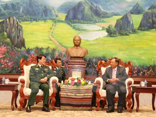 Líder laosiano promete respaldar cooperación militar con Vietnam ảnh 1 Líder laosiano promete respaldar cooperación militar con Vietnam ảnh 1