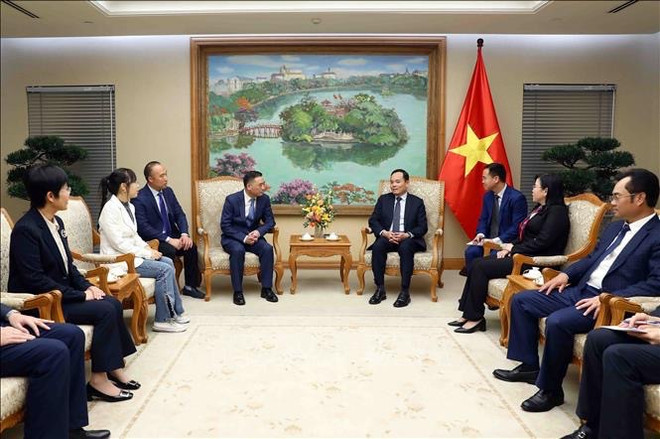 Vicepremier vietnamita recibe a líder de importante grupo chino de alta tecnología ảnh 1
