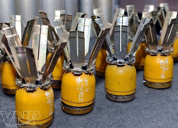 Bombas y minas, una presencia indeseada en vida vietnamita ảnh 5