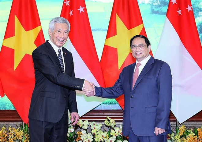 Premier vietnamita sostiene conversaciones con su par singapurense ảnh 1 Premier vietnamita sostiene conversaciones con su par singapurense ảnh 1