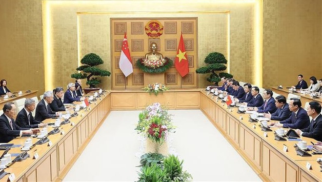 Premier vietnamita sostiene conversaciones con su par singapurense ảnh 2 Premier vietnamita sostiene conversaciones con su par singapurense ảnh 2