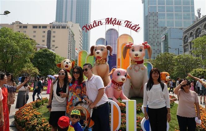 [Fotos] Abierta calle floral Nguyen Hue en Ciudad Ho Chi Minh en días festivos del Tet ảnh 3