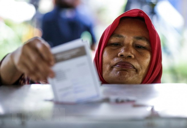 Indonesios convocados hoy a las urnas para comicios regionales ảnh 1 Indonesios convocados hoy a las urnas para comicios regionales ảnh 1