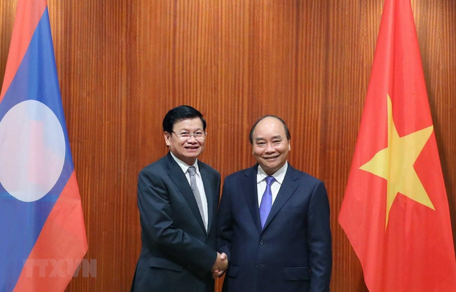 Realiza primer ministro de Laos visita a Vietnam ảnh 1 Realiza primer ministro de Laos visita a Vietnam ảnh 1