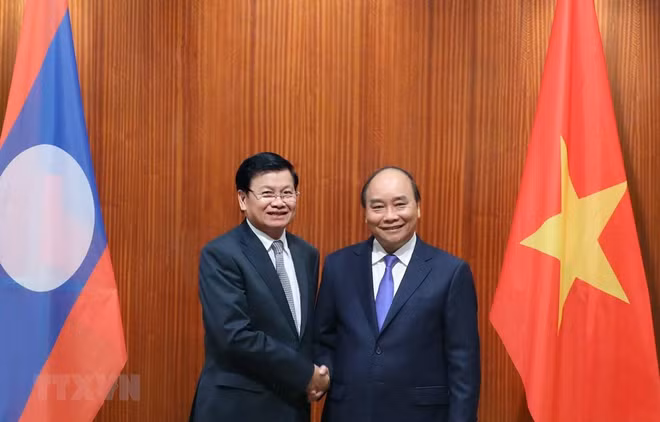 Realiza primer ministro de Laos visita a Vietnam ảnh 1
